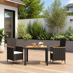 Black Outdoor Dining Set: Steel Frame & PE Rattan Material